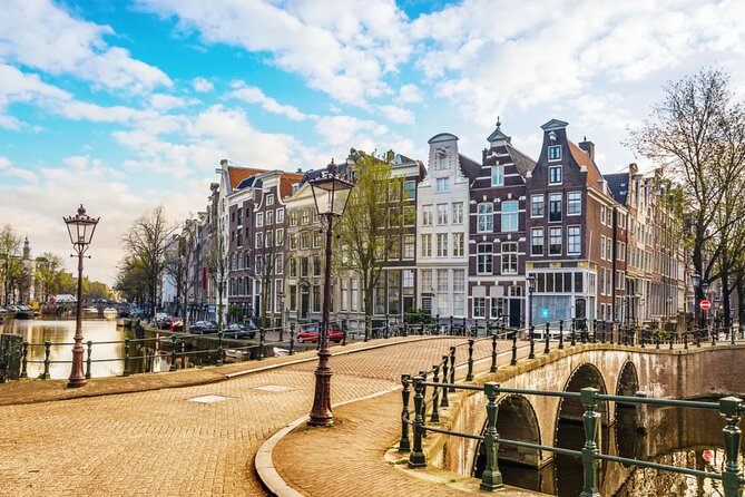 Amsterdam Red Light District Treasure: Self-Guided Tour & Quest - Montelbaanstoren beside the Oude Schans