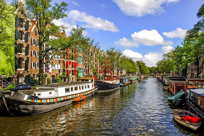 Amsterdam Scavenger Hunt and Highlights Self Guided Audio Tour - National Monument and Royal Palace Amsterdam