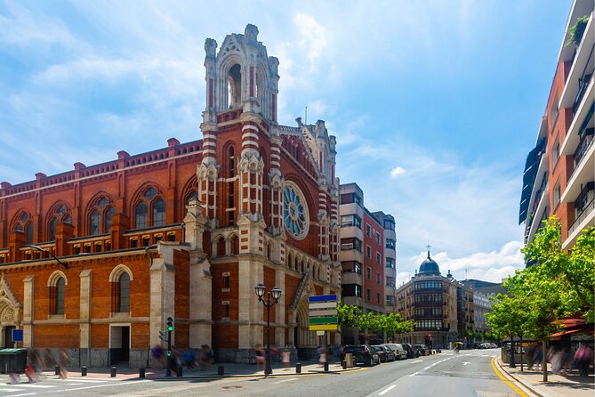 Bilbao Scavenger Hunt and Highlights Self Guided Audio Tour - Crossing the Zubizuri and Passing City Hall