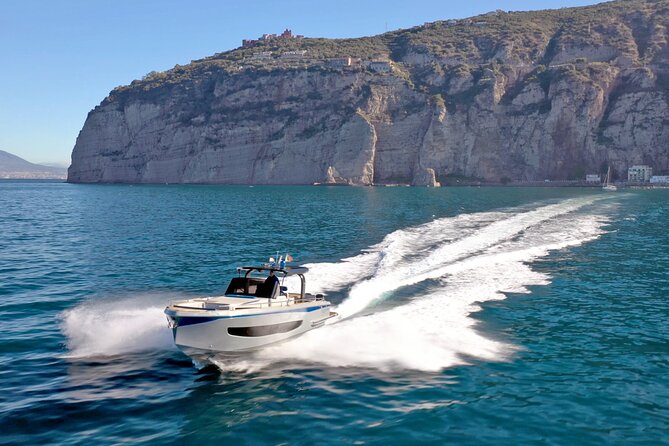 Capri Private all inclusive Boat Tour with City Exploration - Quiet coves and the Heart Cave