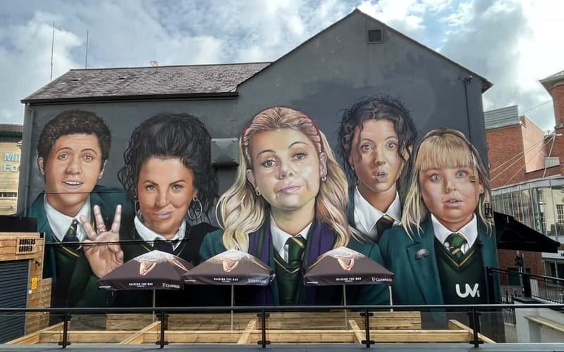 Derry: City Walking Tour & Exploration Game - Derry Girls murals and unusual local stories