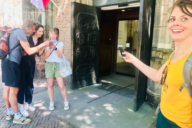 Discover Amsterdam's city center in this Outside Escape game tour - Former canal houses on Nieuwezijds Voorburgwal