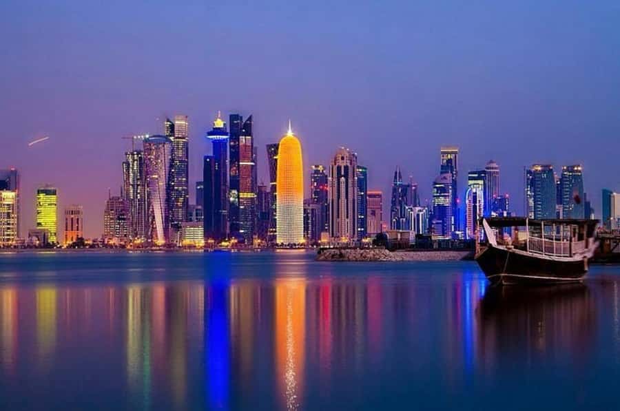 Doha Delights: City Exploration & Traditional Dhow Cruise - A traditional dhow view of Doha Bay