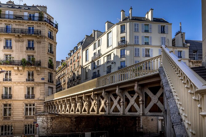 Edith Piaf’s Paris: Self-Guided Story Puzzle Walk - Moulin Rouge is a landmark, not a show ticket