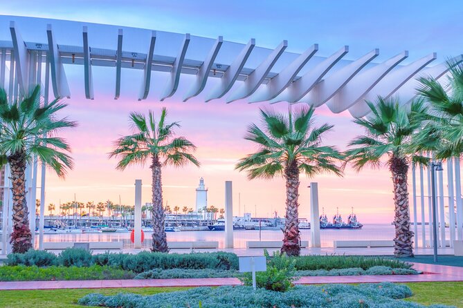 Malaga Scavenger Hunt and Highlights Self Guided Audio Tour - Palmeral de las Sorpresas leads you toward the harbor