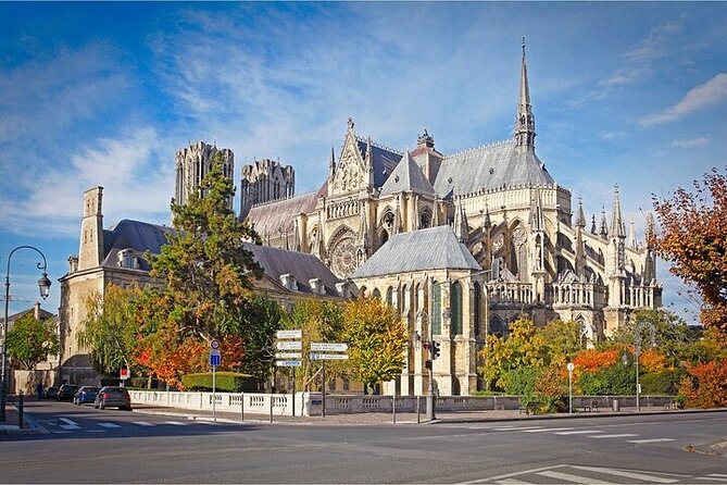 Reims Scavenger Hunt and Highlights Self Guided Audio Tour - Porte de Mars turns a Roman monument into a clue