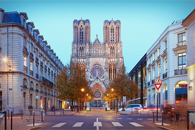 Reims Scavenger Hunt and Highlights Self Guided Audio Tour - Carnegie Library pairs a landmark with local tips