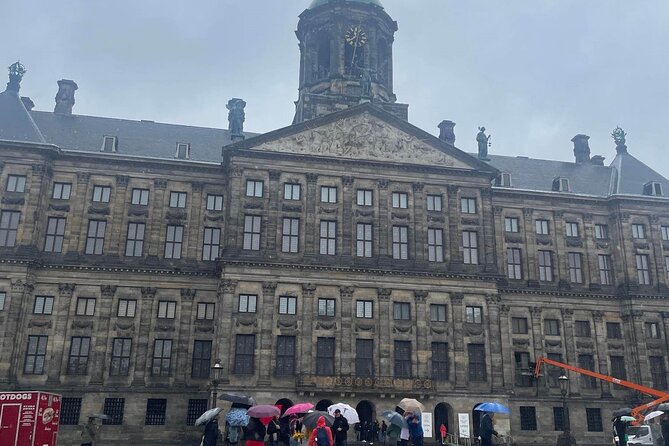 Self-Guided Mystery Hunt by Dam Square in Amsterdam - A city walk with a story behind it